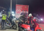 Polsek Maluk Gencarkan Patroli Dialogis di Desa Pasir Putih, Warga Diimbau Waspadai Investasi Bodong dan Penipuan Online