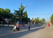SATLANTAS POLRES DOMPU LAKSANAKAN RAWAN PAGI DAN STRONG POINT, WUJUDKAN KAMSELTIBCAR LANTAS YANG AMAN DAN LANCAR