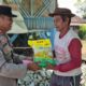 Polres Bima Kota Gelar Cooling System dan Salurkan Bansos HUT Bhayangkara ke-80 kepada Warga Lewirato