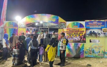 Bhabinkamtibmas Desa Ta’a Laksanakan Pengamanan Pasar Malam, Ajak Masyarakat Jaga Kamtibmas