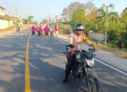 Polsek Empang Kawal Meriahnya Jalan Sehat HUT Desa Lamenta ke-22, Diikuti Ratusan Warga dan Senam Bersama