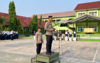 Kapolres Bima Kota Pimpin Upacara POLIDIK di SMPN 2, Ajak Siswa Jauhi Bullying dan Narkoba